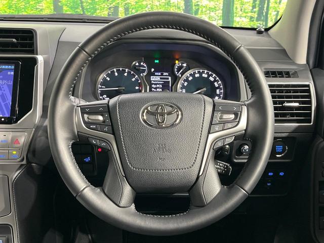 ランドクルーザープラド ＴＸ　Ｌパッケージ　禁煙車　ＢＩＧ－Ｘ９インチナビ　サンルーフ　フリップダウンモニター　バックカメラ　パワーシート　本革シート　純正革巻ステアリング　純正１９インチアルミホイール　ＬＥＤヘッドライト（11枚目）