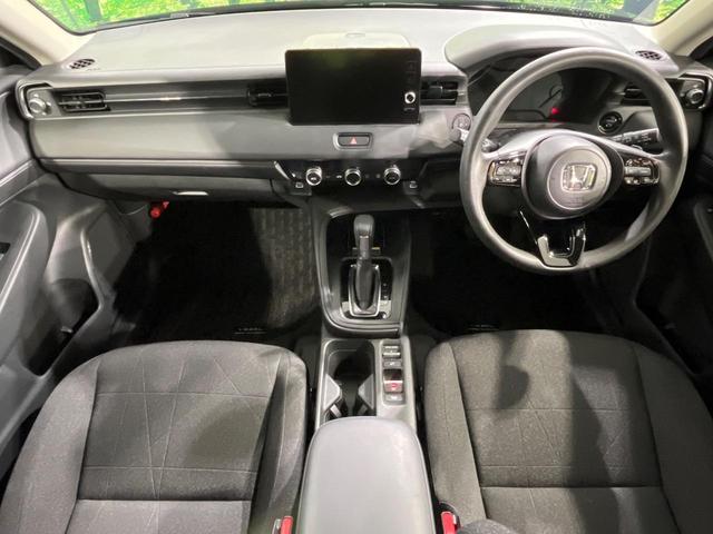 ヴェゼル ｅ：ＨＥＶ　Ｘ　禁煙車　純正９型ナビ　バックカメラ　衝突被害軽減システム　レーダークルーズ　コーナーセンサー　スマートキー　ＬＥＤヘッド　ＥＴＣ２．０　車線逸脱警報　オートライト　オートエアコン（2枚目）