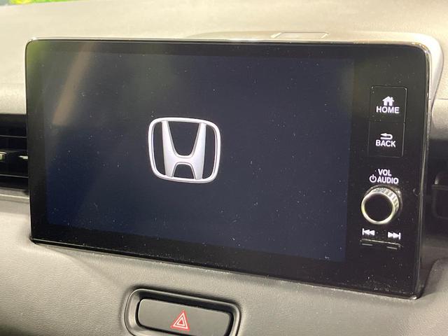 ヴェゼル ｅ：ＨＥＶ　Ｘ　禁煙車　純正９型ナビ　バックカメラ　衝突被害軽減システム　レーダークルーズ　コーナーセンサー　スマートキー　ＬＥＤヘッド　ＥＴＣ２．０　車線逸脱警報　オートライト　オートエアコン（3枚目）