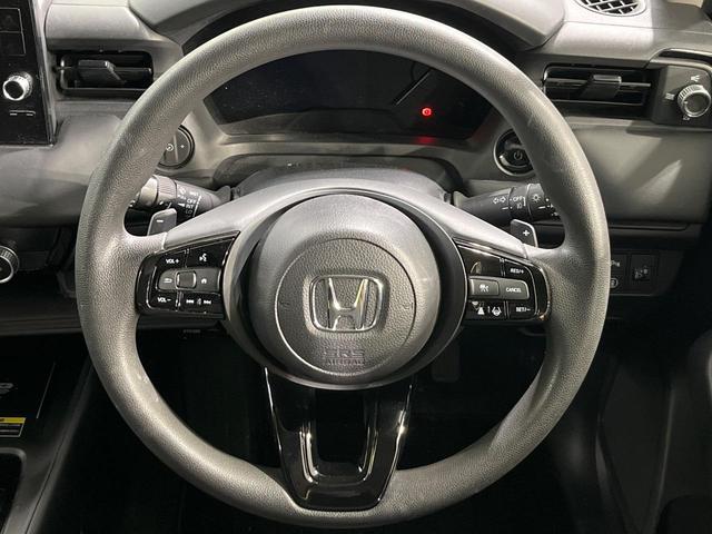 ヴェゼル ｅ：ＨＥＶ　Ｘ　禁煙車　純正９型ナビ　バックカメラ　衝突被害軽減システム　レーダークルーズ　コーナーセンサー　スマートキー　ＬＥＤヘッド　ＥＴＣ２．０　車線逸脱警報　オートライト　オートエアコン（11枚目）