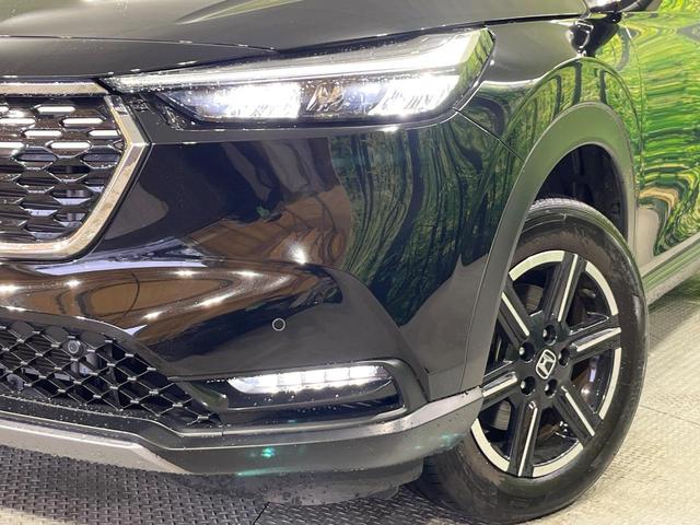 ヴェゼル ｅ：ＨＥＶ　Ｘ　禁煙車　純正９型ナビ　バックカメラ　衝突被害軽減システム　レーダークルーズ　コーナーセンサー　スマートキー　ＬＥＤヘッド　ＥＴＣ２．０　車線逸脱警報　オートライト　オートエアコン（12枚目）