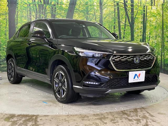 ヴェゼル ｅ：ＨＥＶ　Ｘ　禁煙車　純正９型ナビ　バックカメラ　衝突被害軽減システム　レーダークルーズ　コーナーセンサー　スマートキー　ＬＥＤヘッド　ＥＴＣ２．０　車線逸脱警報　オートライト　オートエアコン（16枚目）