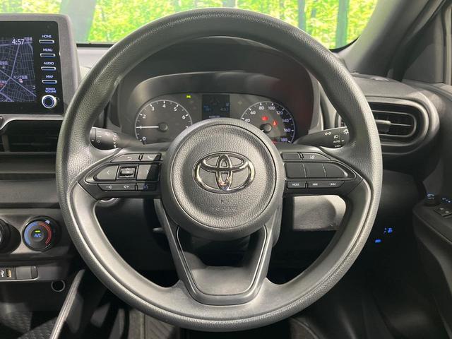 ヤリス Ｘ　禁煙車　純正ナビ付ディスプレイオーディオ　Ｂｌｕｅｔｏｏｔｈ　バックカメラ　ＥＴＣ　セーフティセンス　オートハイビーム　車線逸脱防止装置　ステアリングスイッチ　ヘッドライトレベライザー　スマートキー（9枚目）