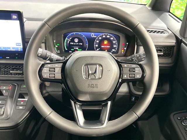 ステップワゴン ｅ：ＨＥＶスパーダ　登録済み未使用車　純正１１．４インチナビ　両側電動スライドドア　アダプティブクルーズコントロール　ブラインドスポットモニター　ＬＥＤヘッドライト　ハーフレザーシート　シートヒーター　フルセグ（11枚目）