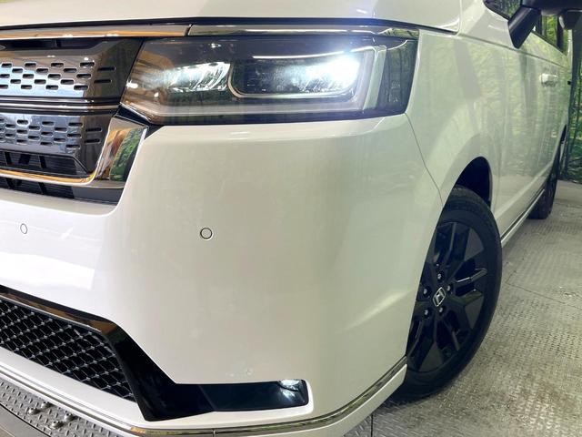 ステップワゴン ｅ：ＨＥＶスパーダ　登録済み未使用車　純正１１．４インチナビ　両側電動スライドドア　アダプティブクルーズコントロール　ブラインドスポットモニター　ＬＥＤヘッドライト　ハーフレザーシート　シートヒーター　フルセグ（12枚目）