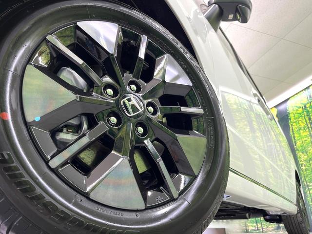 ステップワゴン ｅ：ＨＥＶスパーダ　登録済み未使用車　純正１１．４インチナビ　両側電動スライドドア　アダプティブクルーズコントロール　ブラインドスポットモニター　ＬＥＤヘッドライト　ハーフレザーシート　シートヒーター　フルセグ（13枚目）