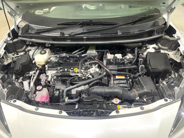 ヤリスクロス ハイブリッドＺ　禁煙車　純正８インチディスプレイオーディオ　バックカメラ　衝突被害軽減システム　レーダークルーズ　ブラインドスポットモニター　シートヒーター　ＥＴＣ　ハーフレザーシート　コーナーセンサー　車線逸脱警報（18枚目）