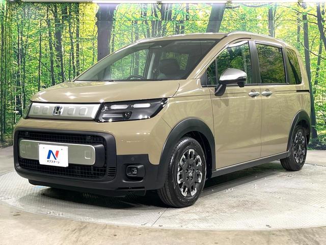 フリード e:HEVクロスター 登録済未使用車 両側電動ドア ホンダセンシング アダプティブクルーズ スマートキー 衝突被害軽減システム ハーフレザーシート コーナーセンサー LEDヘッド 車線逸脱警報 オートライト LEDフォグ(25枚目)