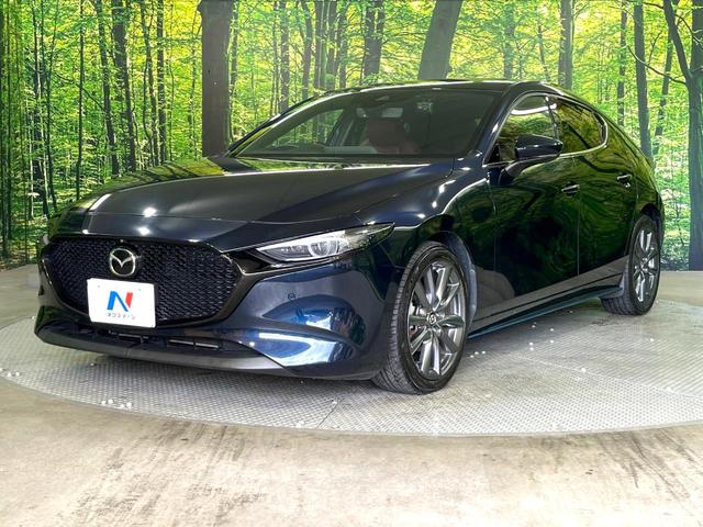 MAZDA3ファストバック 20Sバーガンディ セレクション 禁煙車 純正8.8型ナビ 360度ビューモニター 柿本マフラー 衝突被害軽減装置 赤革シート シートヒーター クリアランスソナー ステアリングヒーター オートエアコン 純正18AW スマートキー(52枚目)