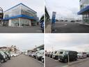 大きなNマークの看板が目印!広々とした駐車場をご用意してお待ちしております。展示場には250台以上のバリエーション豊かな在庫をご用意。メーカー問わず比較していただけます。