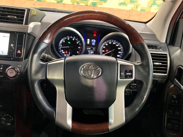 ランドクルーザープラド TX Lパッケージ サンルーフ 7インチSDナビ バックカメラ 100V電源 禁煙車 レザーシート 前席シートエアコン コーナーセンサー LEDヘッド クルコン オートライト デュアルエアコン 電動格納サードシート(11枚目)