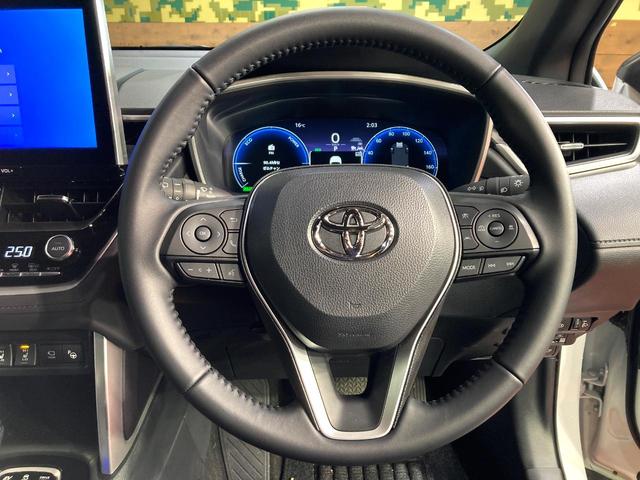 カローラクロス ハイブリッド Z ガラスルーフ 純正10型ディスプレイオーディオ 全周囲カメラ 衝突被害軽減システム レーダークルーズ 禁煙車 電動リアゲート ハーフレザーシート パワーシート ドラレコ LEDヘッド ルーフレール(11枚目)