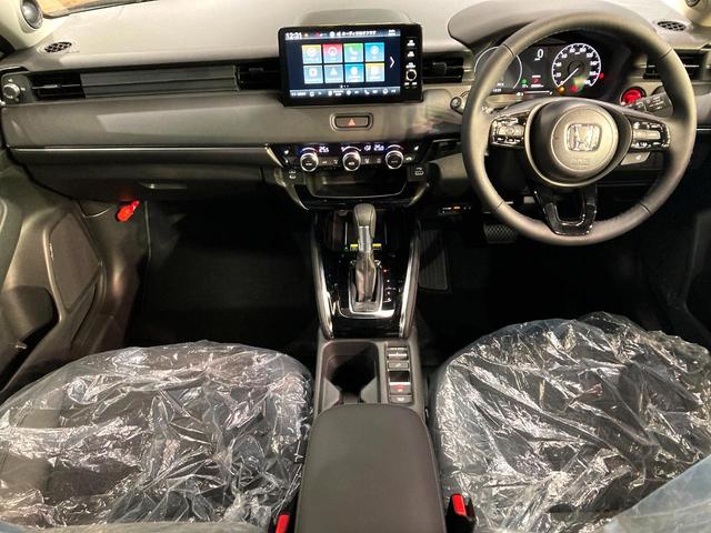 ヴェゼル ｅ：ＨＥＶ　Ｚ　登録済未使用車　９型メーカーナビ　全周囲カメラ　衝突被害軽減システム　レーダークルーズ　電動リアゲート　ハーフレザーシート　コーナーセンサー　スマートキー　ＬＥＤヘッド　ＥＴＣ２．０（2枚目）