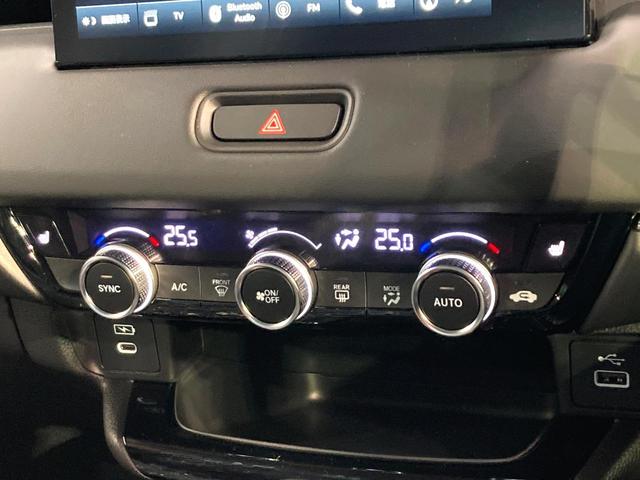 ヴェゼル ｅ：ＨＥＶ　Ｚ　登録済未使用車　９型メーカーナビ　全周囲カメラ　衝突被害軽減システム　レーダークルーズ　電動リアゲート　ハーフレザーシート　コーナーセンサー　スマートキー　ＬＥＤヘッド　ＥＴＣ２．０（49枚目）