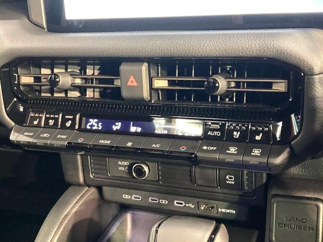 ランドクルーザー２５０ ＶＸファーストエディション　７人乗り　サンルーフ　純正１２型ディスプレイ　全周囲カメラ　衝突被害軽減システム　レーダークルーズ　禁煙車　電動リアゲート　レザーシート　前席シートエアコン　コーナーセンサー　スマートキー（50枚目）