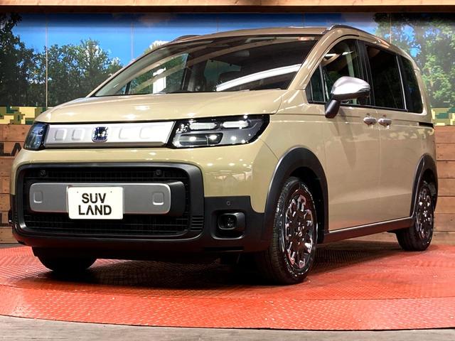 フリード ｅ：ＨＥＶクロスター　登録済未使用車　６人乗り　両側電動スライドドア　シートヒーター　ブラインドスポットモニター　ホンダセンシング　レーダークルーズ　ＬＥＤヘッドライト　スマートキー　ステアリングリモコン（21枚目）