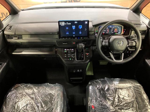 ステップワゴン スパーダ　登録済未使用車　両側電動ドア　純正１１．４型ナビ　バックカメラ　衝突被害軽減システム　レーダークルーズ　パワーバックドア　コーナーセンサー　スマートキー　ＬＥＤヘッド　純正１６インチアルミ　フルセグ（2枚目）