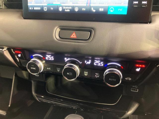 ヴェゼル ｅ：ＨＥＶ　Ｚ　登録済未使用車　純正９型ナビ　全周囲カメラ　衝突被害軽減システム　電動リアゲート　ハーフレザーシート　コーナーセンサー　スマートキー　ＬＥＤヘッド　ＥＴＣ２．０　純正１８インチアルミ（34枚目）