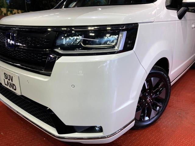 ステップワゴン e:HEVスパーダ 登録済未使用車 両側電動ドア 純正SDナビ バックカメラ 衝突被害軽減システム レーダークルーズ 電動リアゲート ハーフレザーシート コーナーセンサー スマートキー LEDヘッド(12枚目)