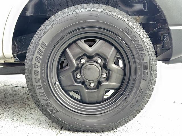 ジムニー ＸＧ　４ＷＤ　ＥＴＣ　ＴＶ　キーレスエントリー　ＡＴ　ＡＢＳ　衝突安全ボディ　エアコン　パワーウィンドウ（48枚目）