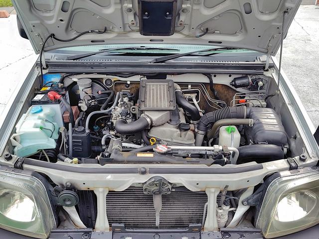 ジムニー ＸＧ　４ＷＤ　ＥＴＣ　ＴＶ　キーレスエントリー　ＡＴ　ＡＢＳ　衝突安全ボディ　エアコン　パワーウィンドウ（52枚目）