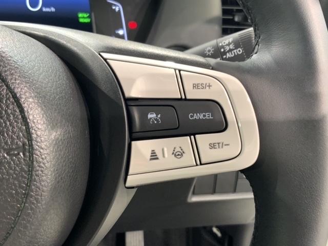 フィット ｅ：ＨＥＶクロスター　ＨＳＥＮＳＩＮＧ２ト－ン新車保証試乗車　衝突回避システム　１オーナー　フルオートエアコン　整備記録簿　ＬＥＤランプ　エアバッグ　サイドエアバック　地デジ　オートクルーズコントロール　ＶＳＡ　ＥＴＣ（11枚目）