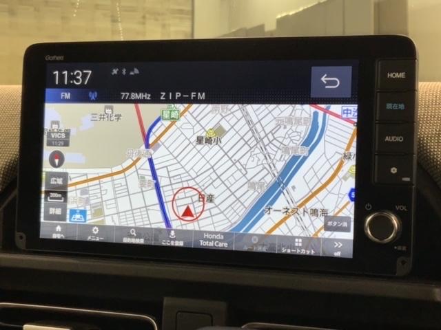 フリード エアーEX HSENSING新車保証試乗車ワンオーナー バックモニター 盗難防止システム 両側パワースライドドア 横滑り防止装置 クルコン フルセグ ETC車載器 オートエアコン シートヒーター 3列シート(6枚目)
