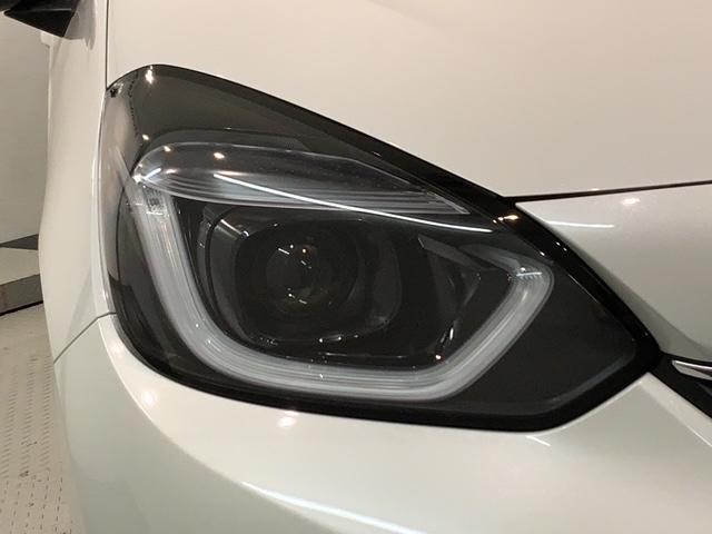 フィット ホーム H SENSING 新車保証 試乗車 ワンオーナー ナビVXU-245FTi TV Rカメラ CD録音 BTオ-ディオ DVD ETC LEDライト VSA クルコン スマートキー 盗難防止装置(8枚目)