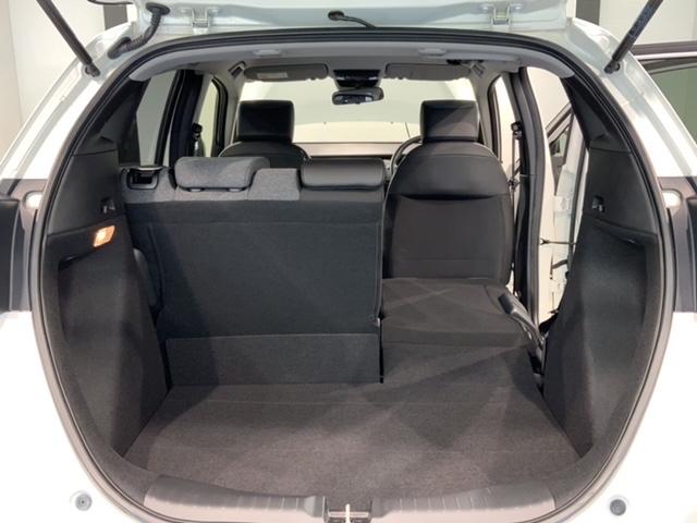 フィット ホーム H SENSING 新車保証 試乗車 ワンオーナー ナビVXU-245FTi TV Rカメラ CD録音 BTオ-ディオ DVD ETC LEDライト VSA クルコン スマートキー 盗難防止装置(38枚目)