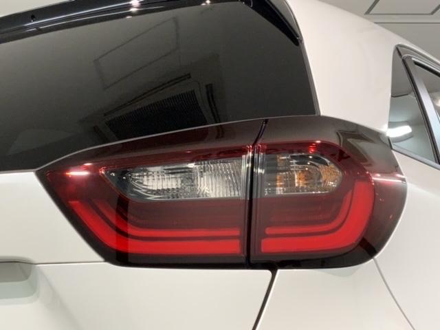 フィット ホーム H SENSING 新車保証 試乗車 ワンオーナー ナビVXU-245FTi TV Rカメラ CD録音 BTオ-ディオ DVD ETC LEDライト VSA クルコン スマートキー 盗難防止装置(45枚目)