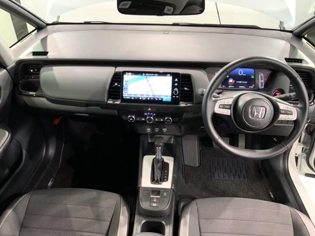 フィット e:HEVクロスター H SENSING 2ト-ン 新車保証 試乗車 ワンオ-ナ- 純正ナビ TV Rカメラ BTオ-ディオ ETC LEDライト VSA クルコン アルミ スマ-トキ- 盗難防止装置 整備記録簿 AAC(9枚目)