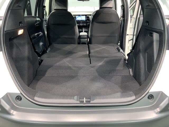 フィット e:HEVクロスター H SENSING 2ト-ン 新車保証 試乗車 ワンオ-ナ- 純正ナビ TV Rカメラ BTオ-ディオ ETC LEDライト VSA クルコン アルミ スマ-トキ- 盗難防止装置 整備記録簿 AAC(19枚目)