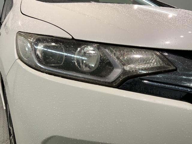 フィットハイブリッド Ｓパッケージ　あんしんＰＫＧ　１年保証　ワンオーナー　純正ナビ　ＴＶ　Ｒカメラ　ＢＴオ－ディオ　ＤＶＤ　ドラレコ　ＥＴＣ　ＬＥＤライト　ＶＳＡ　クルコン　アルミ　フォグ　スマートキー　盗難防止装置　整備記録簿（8枚目）