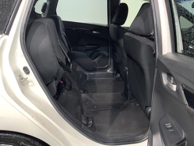 フィットハイブリッド Ｓパッケージ　あんしんＰＫＧ　１年保証　ワンオーナー　純正ナビ　ＴＶ　Ｒカメラ　ＢＴオ－ディオ　ＤＶＤ　ドラレコ　ＥＴＣ　ＬＥＤライト　ＶＳＡ　クルコン　アルミ　フォグ　スマートキー　盗難防止装置　整備記録簿（35枚目）