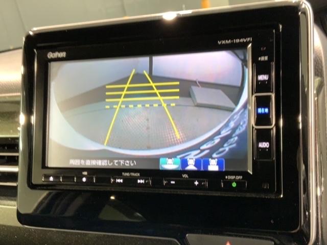 N-BOXカスタム G・Lホンダセンシング 最長5年保証 ワンオーナー ナビVXM-194VFi TV Rカメラ BTオ-ディオ DVD ETC LEDライト VSA クルコン アルミ スマ-トキ- スペアキ- 盗難防止装置 整備記録簿 AAC(7枚目)
