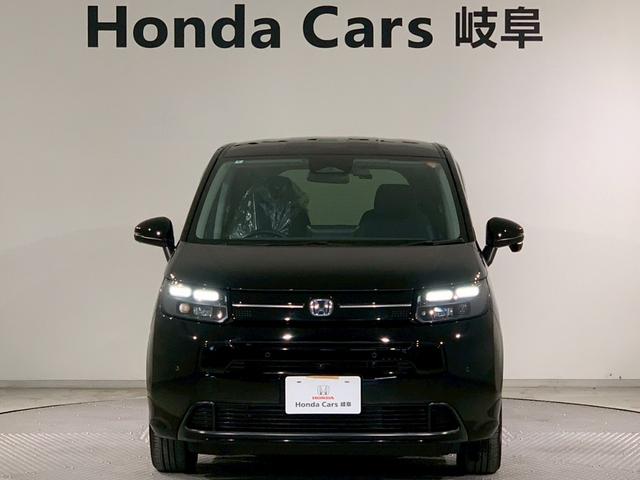 フリード ｅ：ＨＥＶエアーＥＸ　両側電動スライドドア　フルセグＴＶ　メモリナビ（24枚目）