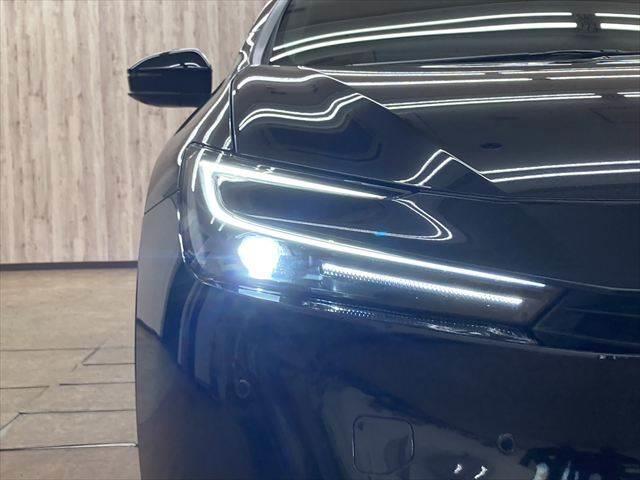 プリウス Ｚ　禁煙車　ガラスルーフ　デジタルインナーミラー　１２．３インチディスプレイオーディオ　全周囲カメラ　レーダークルーズコントロール　Ｂｌｕｅｔｏｏｔｈ　電動リアゲート　シートヒーター　４ＷＤ　寒冷地仕様（31枚目）