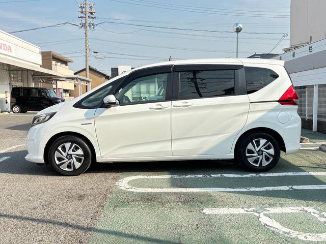 フリードハイブリッド ハイブリッド・Ｇホンダセンシング　メモリーナビ　フルセグＴＶ　ドラレコ　バックモニター　ＬＥＤヘッドライト　両側パワースライド　スマートキー　アダプティブクルコン　ＥＴＣ　アクティブコーナーリングライト（12枚目）