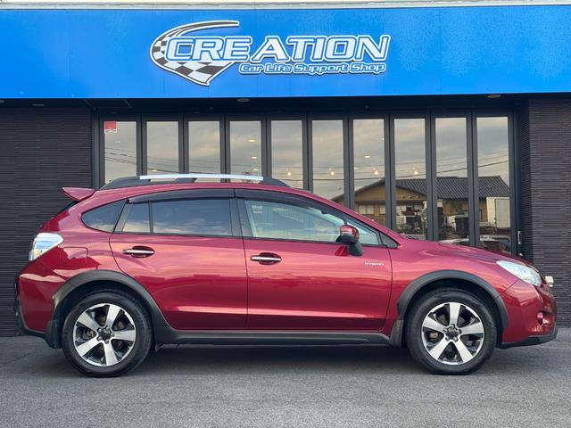 ＸＶハイブリッド ２．０ｉ－Ｌアイサイト　ワンオーナー禁煙車　ナビＴＶ　ＥＴＣ　バックカメラ　コーナーセンサー　Ｂｌｕｅｔｏｏｔｈ接続　レーダークルーズコントロール　レーンアシスト　衝突被害軽減システム　４ＷＤ　オートライト　ＨＩＤ　パワーシート　ルーフレール　スマートキー（8枚目）