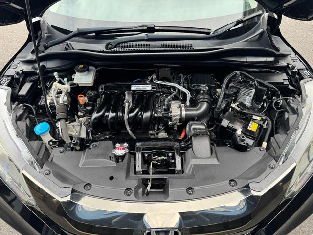 ヴェゼル ハイブリッドＺ・ホンダセンシング　純正８インチナビＴＶ　ＨＤＭＩ接続　Ｂｌｕｅｔｏｏｔｈ接続　バックカメラ　ＣＤ／ＤＶＤ再生　レーダー　前後ドライブレコーダー　ＥＴＣ　ＬＥＤヘッドランプ　アダプティブクルーズコントロール　レーンアシスト　衝突被害軽減（33枚目）