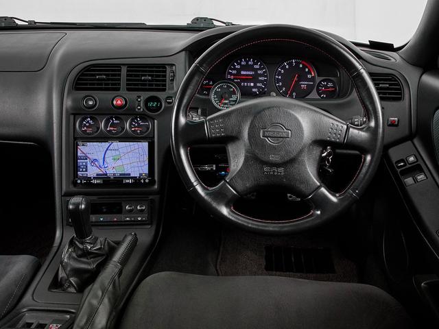 スカイライン GT-R 平成9年後期モデル BCNR33GTR 4WD クルーズコントロール ABS エアバック パワステ パワーウィンドウ エアロ ローダウン ETC ナビ TVフルセグ CD DVD 記録簿(16枚目)