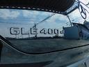 GLE400d 4マチック クーペスポーツ パノラミックスライディングルーフ パナメリカーナグリル フロントアンダースポイラー トランクスポイラー ブラックアウト エアサスペション ブルメスターサウンド ベンチレーター シートヒーター 黒革(23枚目)
