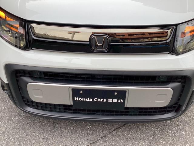 フリード e:HEVクロスター 当店展示車 新車未登録 ブラックエンブレム ボディーサイドモール べルリナブラックフロントグリル マルチビューカメラ アダプティブドライビングビーム 後退出庫サポート付き 専用15インチアルミホイール(6枚目)