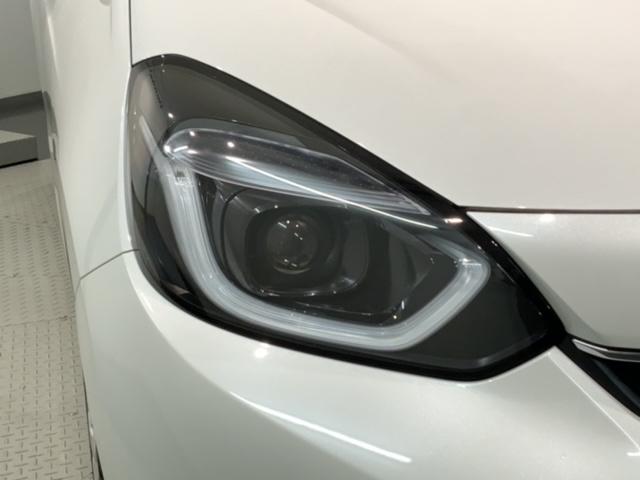 フィット e:HEVホーム H SENSING 新車保証 試乗車 ワンオ-ナ- ナビVXU-245FTi TV Rカメラ CD録音 BTオ-ディオ DVD ETC LEDライト VSA クルコン スマ-トキ- 盗難防止装置(8枚目)