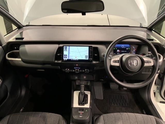 フィット e:HEVホーム H SENSING 新車保証 試乗車 ワンオ-ナ- ナビVXU-245FTi TV Rカメラ CD録音 BTオ-ディオ DVD ETC LEDライト VSA クルコン スマ-トキ- 盗難防止装置(9枚目)
