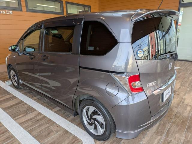 フリードハイブリッド ハイブリッド 1年間走行無制限保証 助手席リフトアップシート仕様 片側電動スライドドア純正NAVI ワンセグ バックカメラ ディスチャージヘッドライトワンオーナー 禁煙車(12枚目)