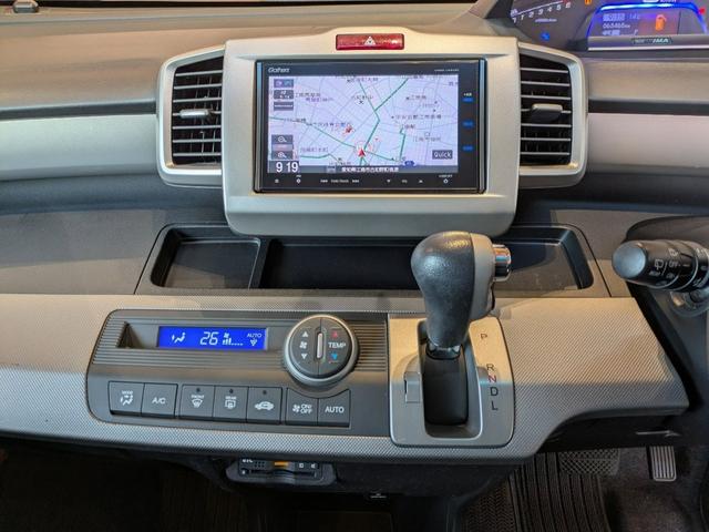 フリードハイブリッド ハイブリッド 1年間走行無制限保証 助手席リフトアップシート仕様 片側電動スライドドア純正NAVI ワンセグ バックカメラ ディスチャージヘッドライトワンオーナー 禁煙車(14枚目)