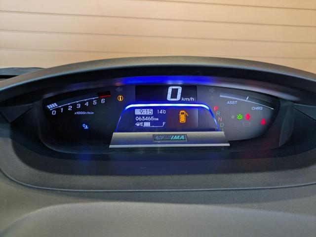 フリードハイブリッド ハイブリッド 1年間走行無制限保証 助手席リフトアップシート仕様 片側電動スライドドア純正NAVI ワンセグ バックカメラ ディスチャージヘッドライトワンオーナー 禁煙車(15枚目)