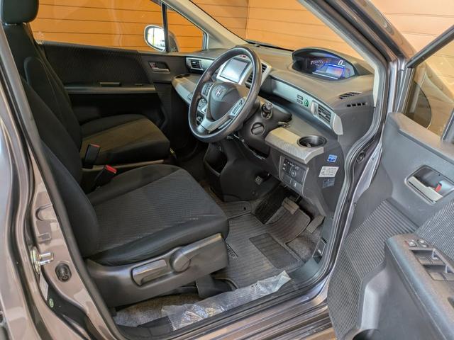 フリードハイブリッド ハイブリッド 1年間走行無制限保証 助手席リフトアップシート仕様 片側電動スライドドア純正NAVI ワンセグ バックカメラ ディスチャージヘッドライトワンオーナー 禁煙車(20枚目)