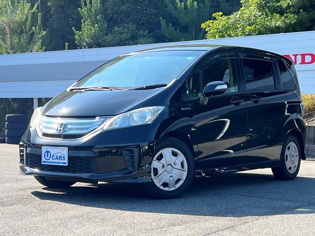 フリードハイブリッド ホンダ ジャストセレクション 純正ギャザズ９インチメモリーインターナビ リアカメラ フルセグ クルーズコントロール リア両側パワースライドドア ２列目ベンチシート ７人乗り ｖｓａ 純正ｅｔｃ スマートキー セキュリティアラーム 愛知県